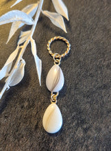 Hiuksia korun pinnalle